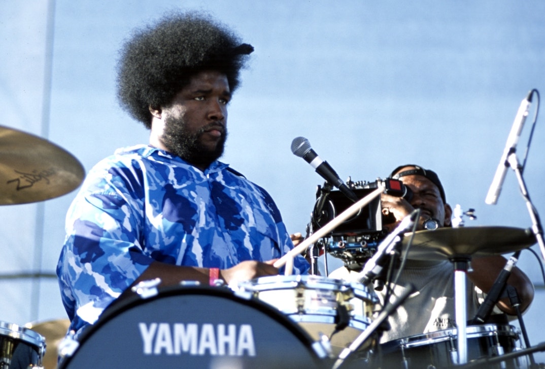 2001: Questlove plays on drums for The Roots