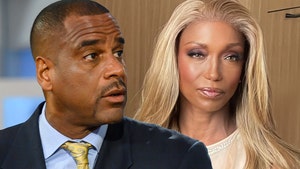 jayson williams and Tanya young williams getty comp