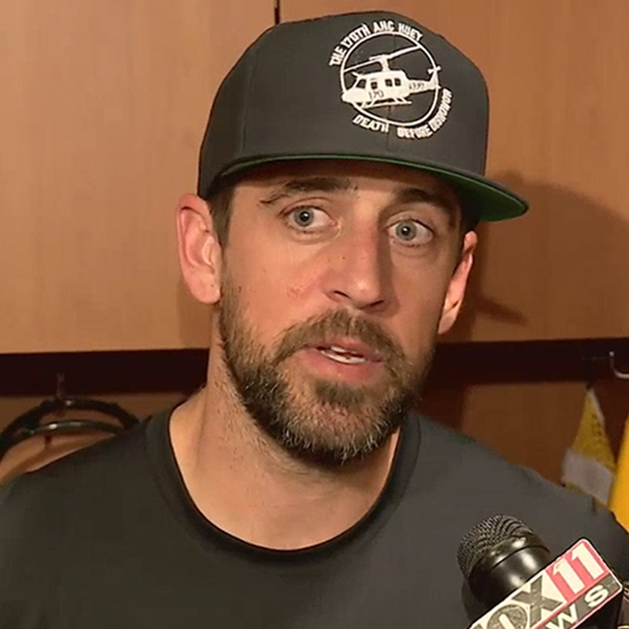 Green Bay Packers' Aaron Rodgers smacks back after beer chugging