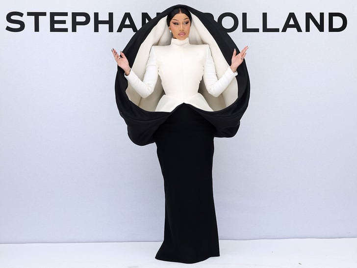 Cardi B Stuns In Black And White Dress For Paris Fashion Week