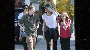 Angelina Jolie & Kids Go for a Dog Walk Amid Custody War with Brad Pitt