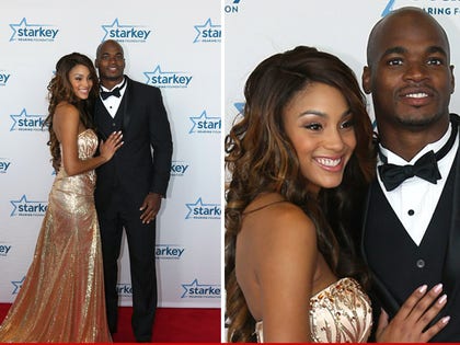 0726_adrian_peterson-with-wife_getty3