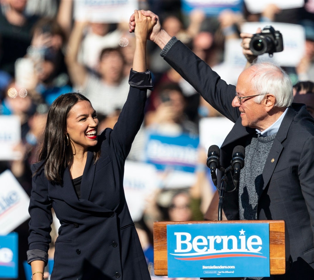 U.S. Representative Alexandria Ocasio-Cortez & U.S. Senator Bernie Sanders on stage at Bernie Sanders Rally 