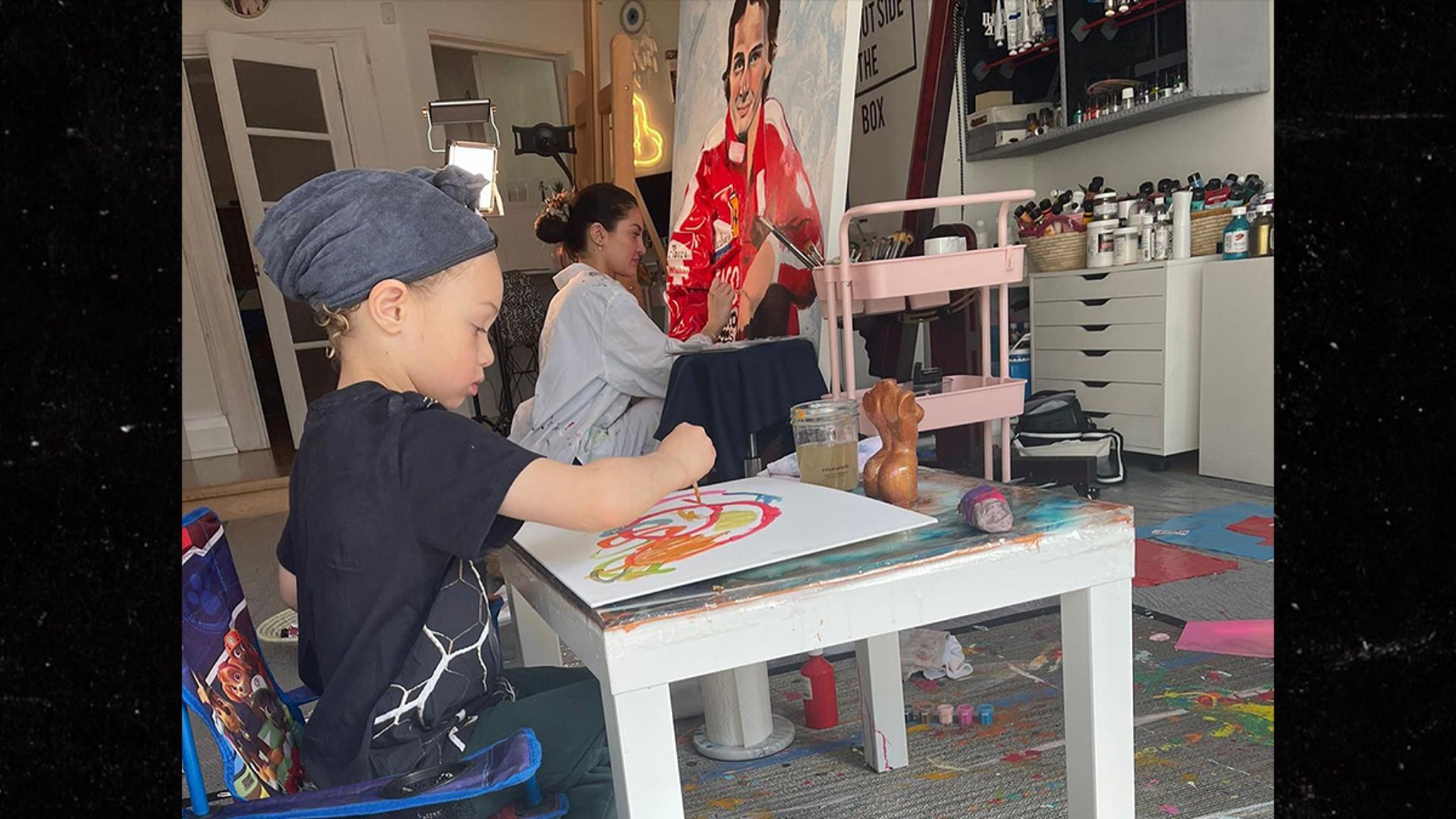 Drake’s Son Adonis Shows Off Artistic Skills Painting with Mom