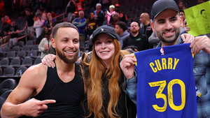 Steph Curry Gifts Lindsay Lohan Jersey for Godson Luai