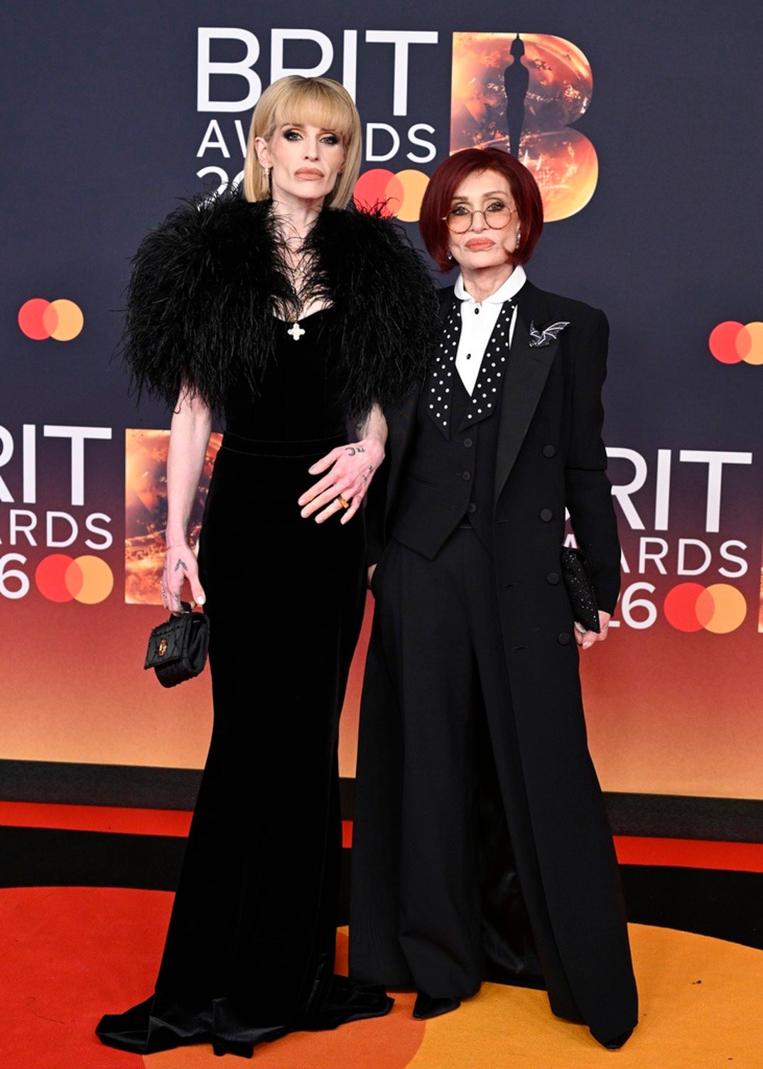 Kelly and Sharon Osbourne