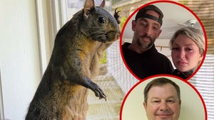 peanut the squirel mark longo and wife George Richter.