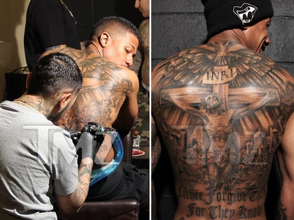 0313_nick_cannon_complete_back_tattoo_launch