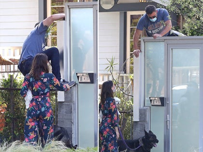 0507-Ben-Affleck-Ana-de-Armas-locked-out-hop-fence-photos-primary