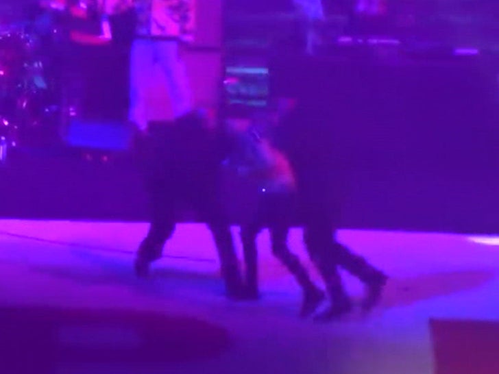 Justin Bieber Fan Rushes Stage While He Performs at Jingle Bell Ball