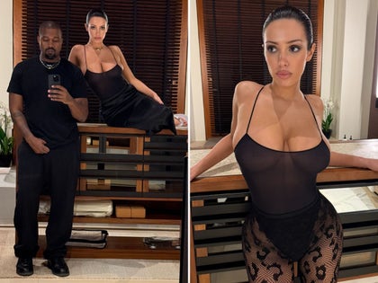 Kanye West And Bianca Censori Taking a Selfie In A Mirror Wearing All Black Clothes