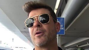 Robin Thicke Says Jay-Z's Getting People Talking, Sit or Stand