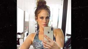 Jennifer Lopez Reveals ID of Creepy Guy in Background of Her Gym Selfie