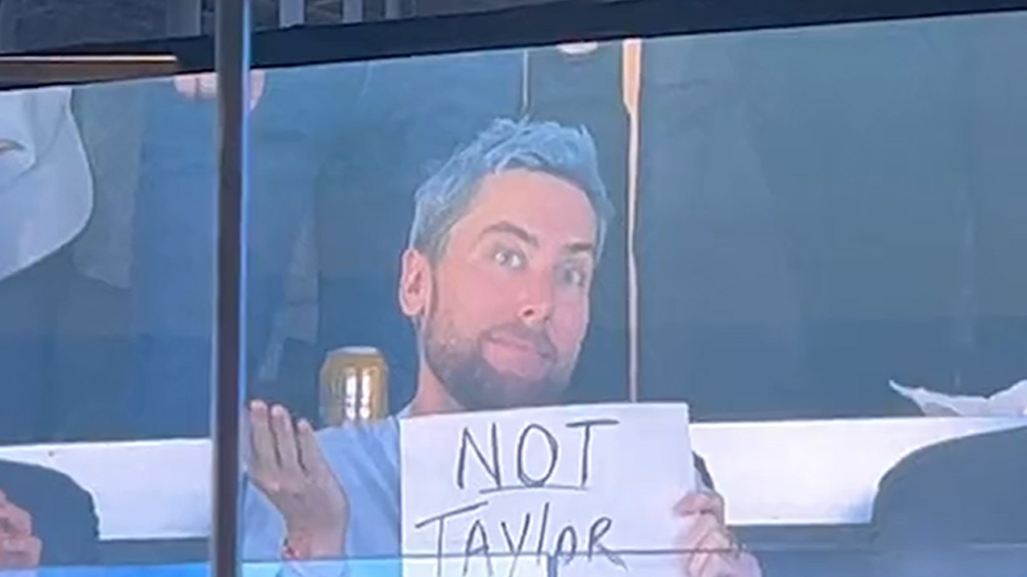 Lance Bass Trolls NFL with ‘Not Taylor Swift’ Sign During Chargers Game