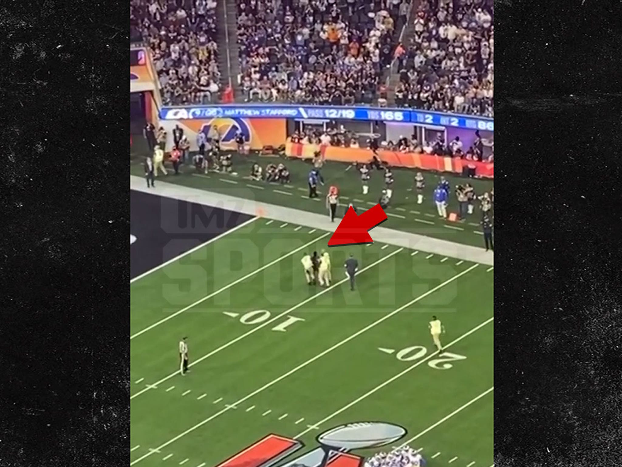 Fan arrested after running wild on field at Super Bowl 2022