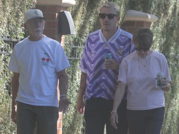 Macklemore in Seattle with parents backgrid
