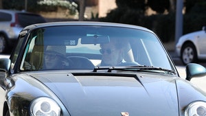 Felicity Huffman Enjoying Life on the Outside in Porsche Style