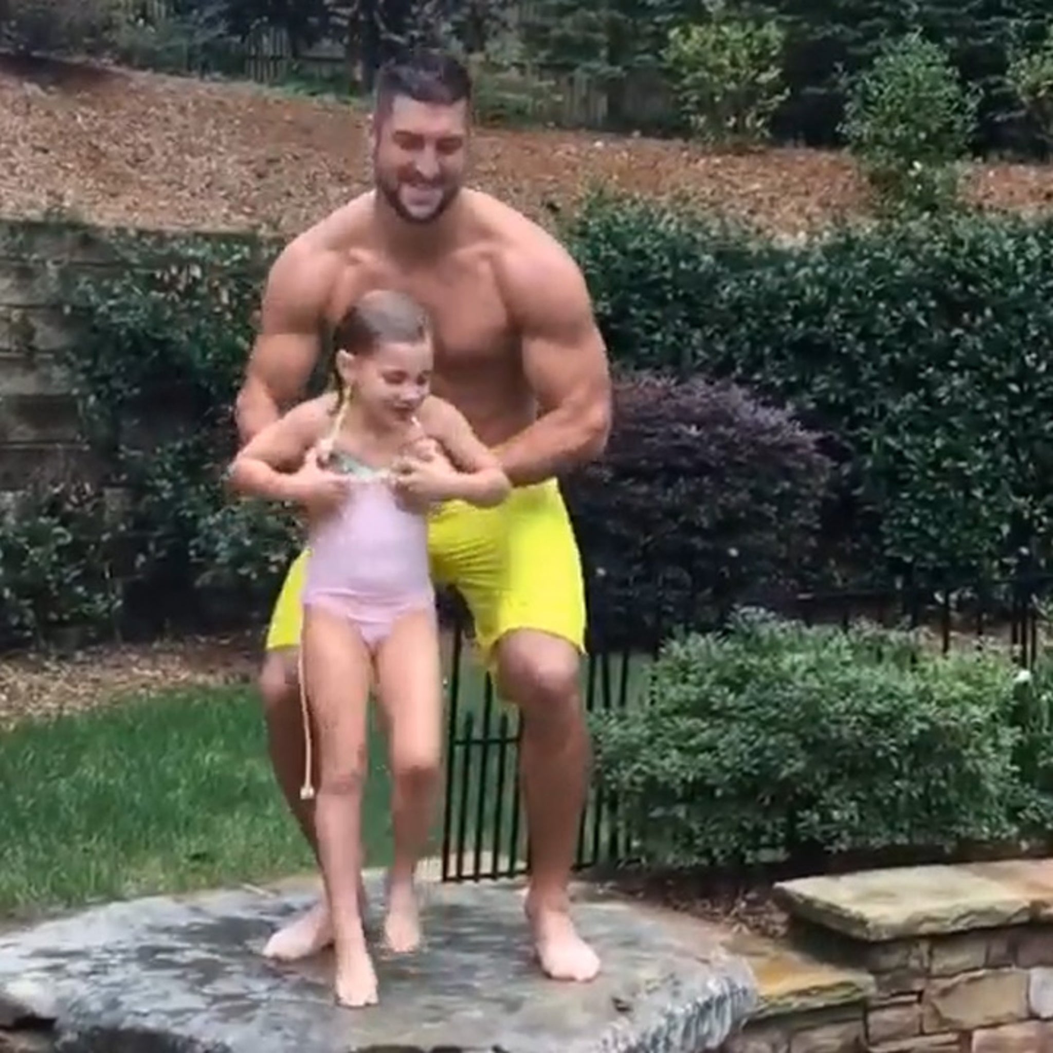 Tim Tebow -- Jacked, Shirtless, Tossing Children (VIDEO)