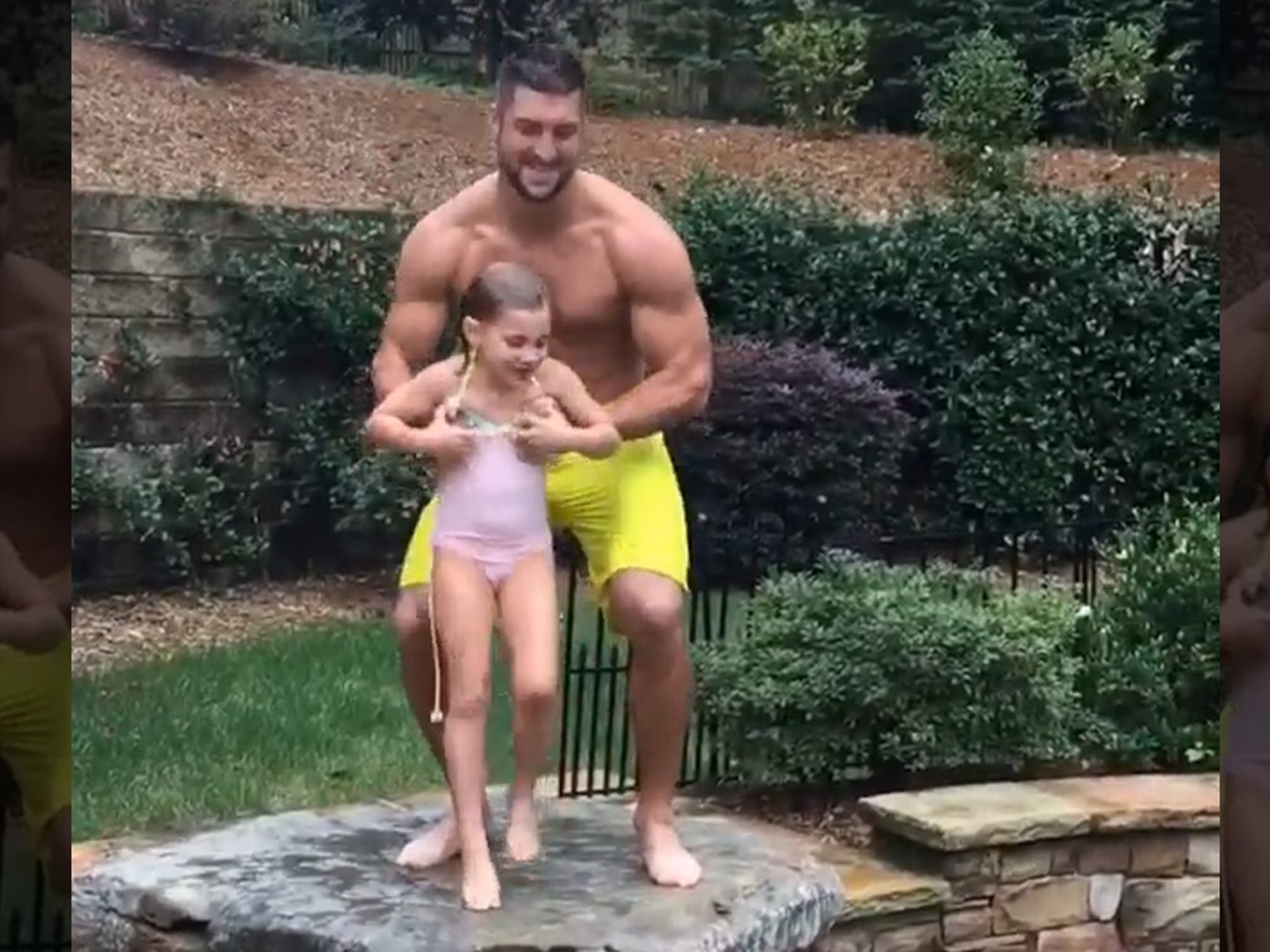Tim Tebow -- Jacked, Shirtless, Tossing Children