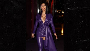 Cardi B Wears Purple Latex During Paris Fashion Week