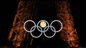 Moon Rises Perfectly Inside Eiffel Tower's Olympic Rings, Stunning Images