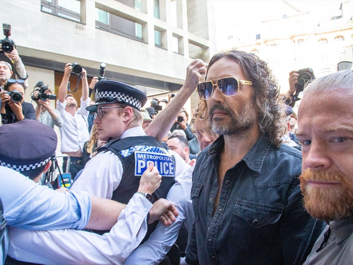 russel brand arriving court shutterstock 1