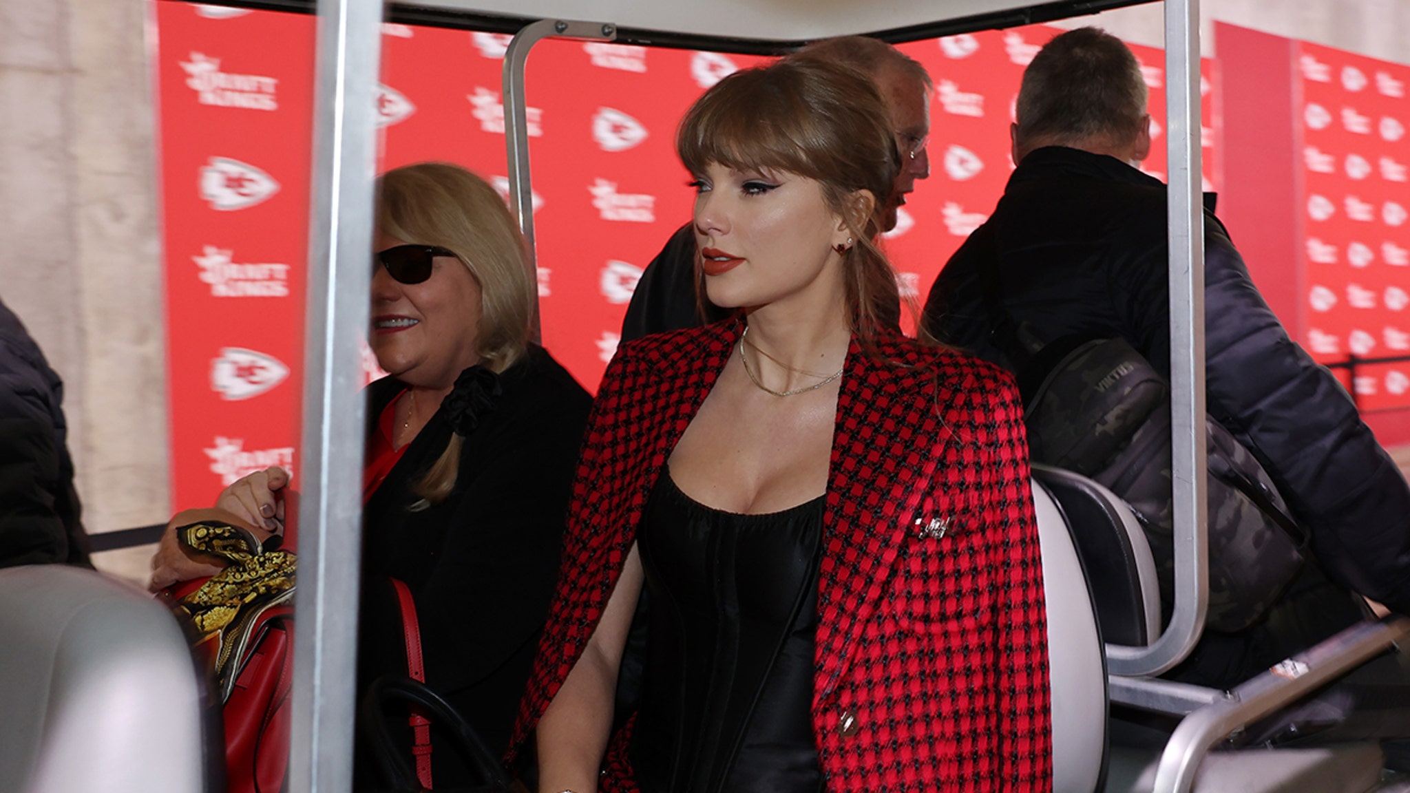 Taylor Swift Standing on Business, Blazer and Miniskirt at Chiefs Game