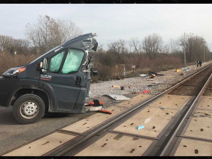 amazon truck split in half by train