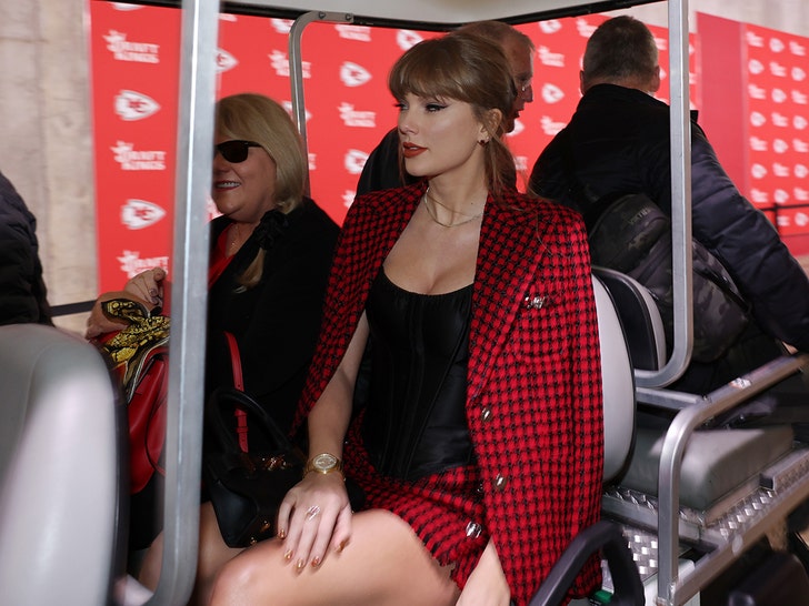 Taylor Swift Standing on Business, Blazer and Miniskirt at Chiefs Game