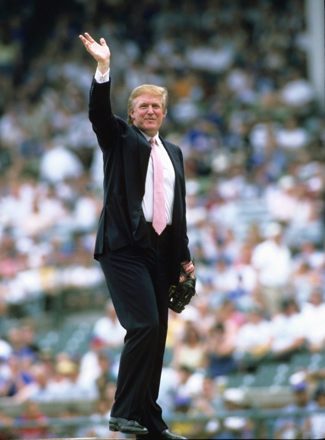 Donald Trump throws out the first pitch before a game between the Chicago White Sox and the Chicago Cubs.