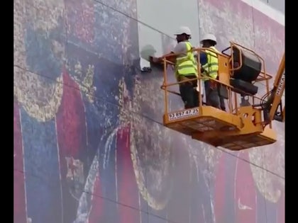 messi poster tear down