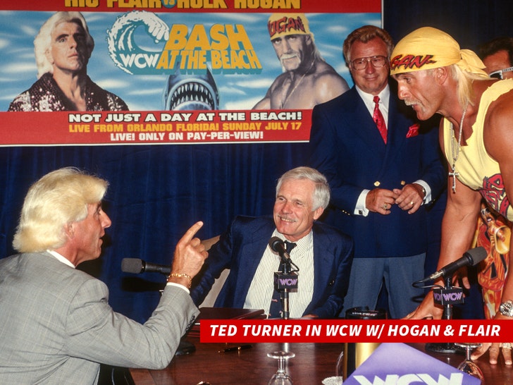Ted Turner in WCW with Hogan and Flair getty