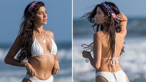 'WAGS' Star Nicole Williams Hits Beach in White Bikini