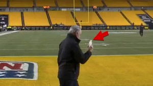 priest blessing the field w holy water 1