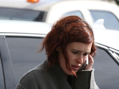 Rumer Willis paced and smoked a cigarette outside the hospital where her mom, Demi Moore, was taken for substance abuse treatment.