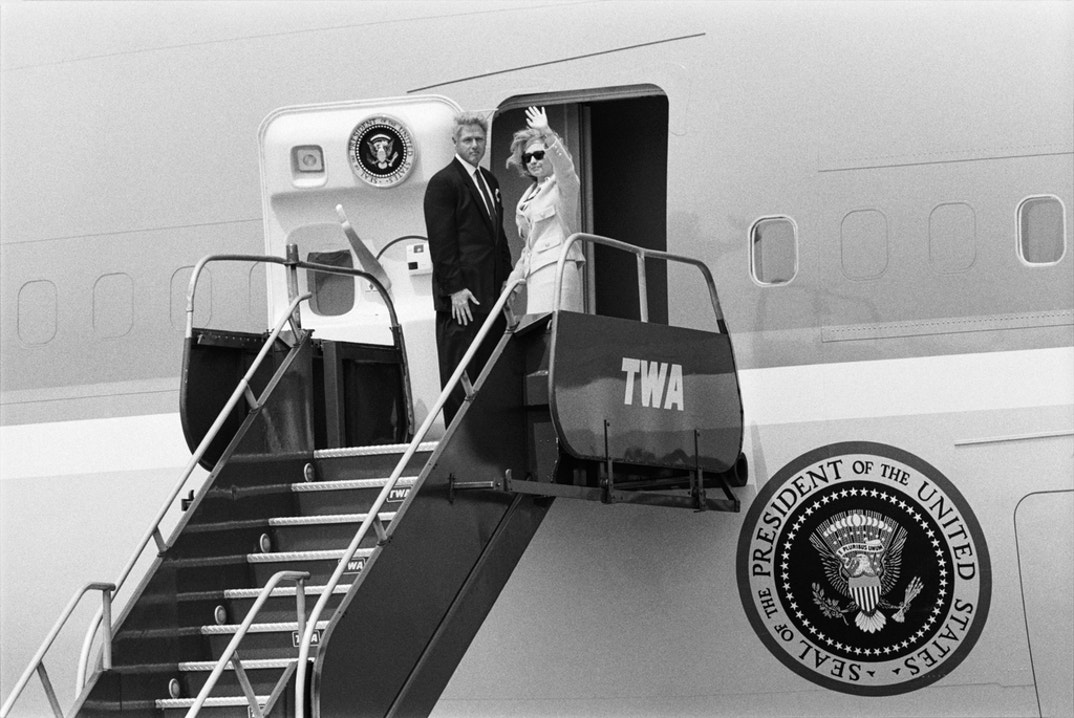 President Bill Clinton and First Lady Hillary Clinton board Air Force One on July 26, 1996 at JFK International Airport following a briefing and press conference regarding the crash of TWA Flight 800. The crash off the coast of New York resulted in the deaths of all 230 crew and passengers aboard. The subsequent investigation blamed the accident on mechanical failure, however, there was much speculation at first that it was the result of a terrorist attack.