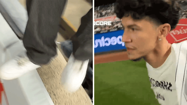 100825_yankee_fan_runs_on_field_live_kal