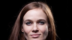 Anika Niles is seen posing for a headshot.