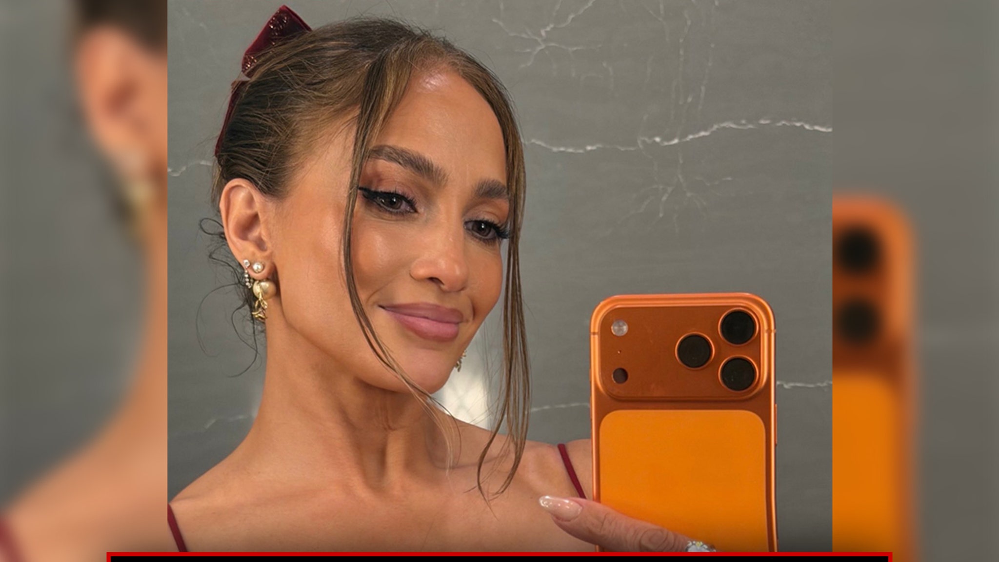 Jennifer Lopez Accused of Photoshop in Bodacious Holiday Dress