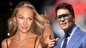 Candice Swamepoel and tom brady getty 1