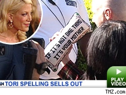 Tori Spelling Sells Out: Click to Watch
