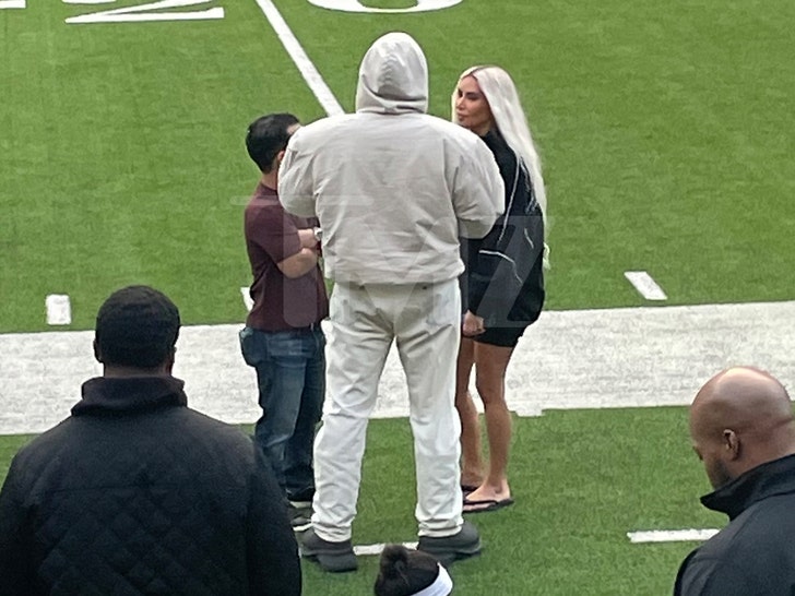74bda94bfeaa4f16a7fa410f100e458f_md Kim Kardashian and Kanye West Attend Saint's Football Game, Chat on Sidelines