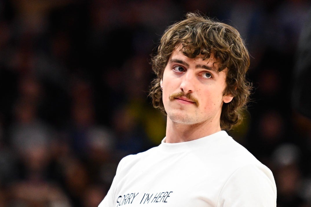 Benson Boone and his moustache check out the Utah Jazz and the Portland Trail Blazers at Delta Center on February 24, 2025 in Salt Lake City