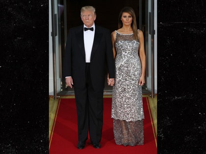0425-donald-trump-melania-hand-hold-getty-01