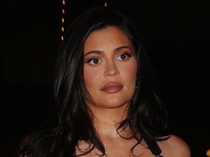 Kylie Jenner Wears Pink Bikini In Pool, Shows Off Body