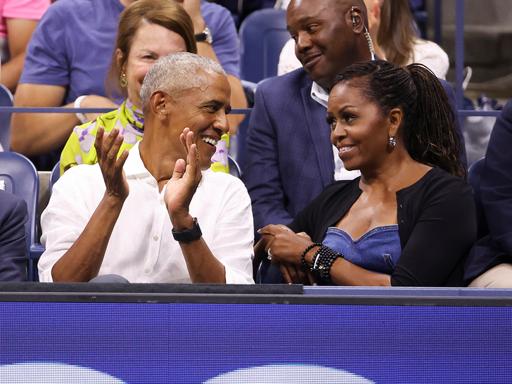 Barack and Michelle Obama watching Novak Djokovic at U.S. Open