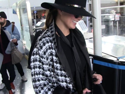 121616_chrissy_teigen_primary