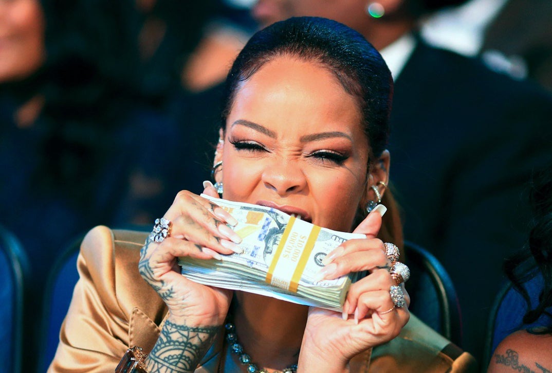 Rihanna scored one of the night's most memorable moments when cameras appeared to catch her arguing with BET programming president Stephen Hill before she tossed a stack of cash in his face and stormed off. The exchange was later revealed to be staged, but it quickly became one of the biggest meme moments of the night.