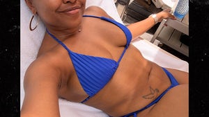 0818-Quinta-Brunson-Blue-Bikini-hero
