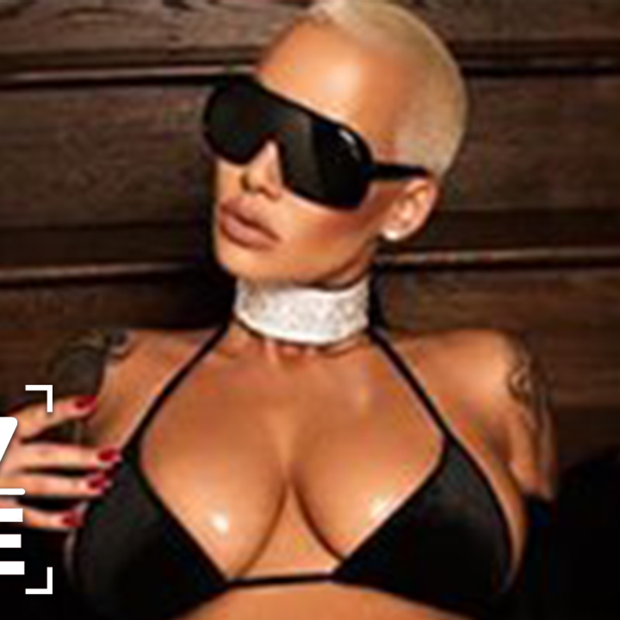 Say Bye To Amber Rose's Big Breast!